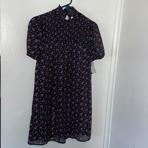 See through floral highneck dress.